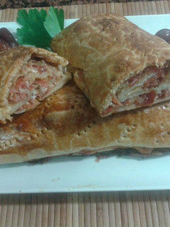 Una foto de Rollo de jamon serrano y queso