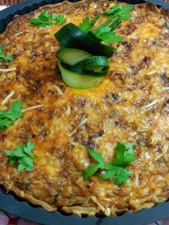 Una foto de Quiche de calabacín cebolleta y puerro