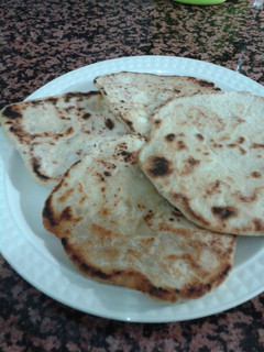 Una foto de Pan naan (Hindú)