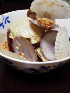 A picture of Butter and Sake Steamed Baby Scallops in Shell.