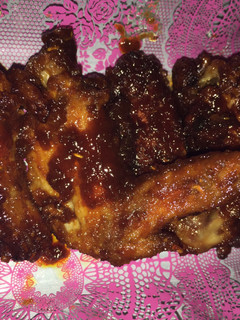 A picture of BBQ Honey Sriracha Baked Chicken Wings.