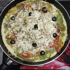 A picture of Healthy pesto pizza.