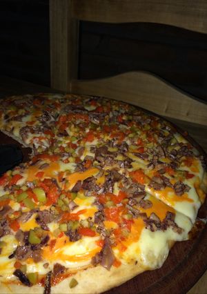 Una foto de Pizza de Calamares Porteña