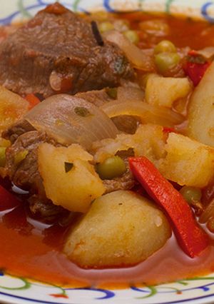 Una foto de Bifes a la portuguesa con papas