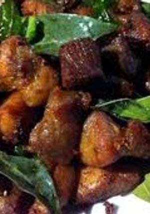Hình của món Thịt xiên nướng lá mắc mật.