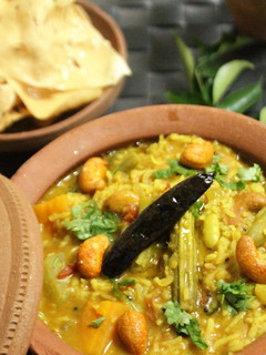 A picture of Sambar Sadam / Rice.