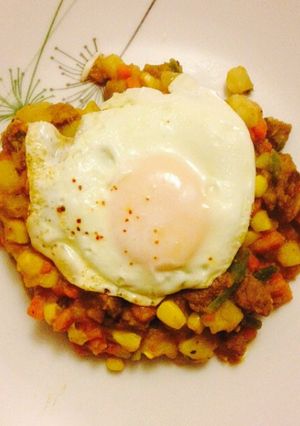 Una foto de Charquicán con huevo frito