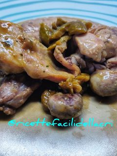 Foto di Coniglio con capperi, olive e zenzero