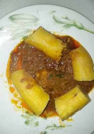 A picture of Boiled plantain with garden egg sauce.