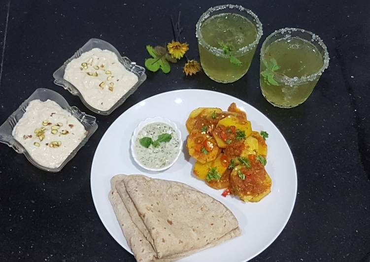 Aloo kutly with roti,kheer and mint margariya