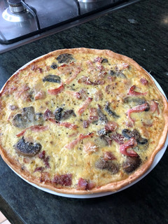 Una foto de Quiche de bacon y champiñones