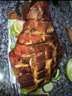 Una foto de Pernil de cerdo adobado