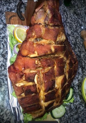 Una foto de Pernil de cerdo adobado