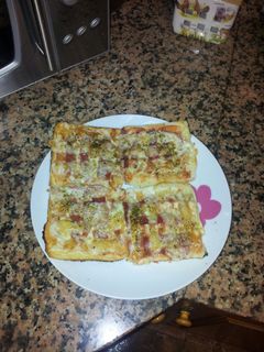 Una foto de Pizza de pan bimbo