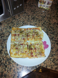 Una foto de Pizza de pan bimbo