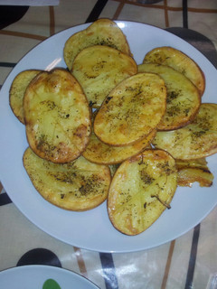 Una foto de Patatas al horno y patata Hasselback