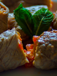 Una foto de Rollitos de ternera, queso y pimientos