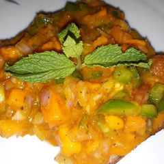 A picture of Mango salsa on toast.