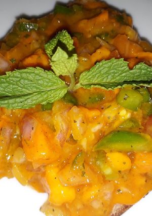 A picture of Mango salsa on toast.