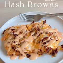 A picture of Chili Oil Eggs Hash Browns with Spicy Ranch.