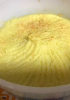 Una foto de Puré de papas con queso extra