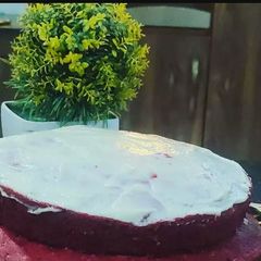 A picture of 2 tier Red velvet cake.