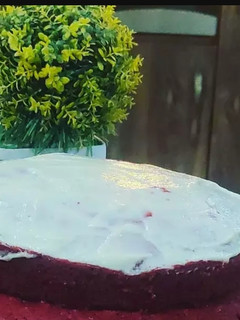 A picture of 2 tier Red velvet cake.