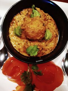 A picture of Restaurant style Lotus Stem Kofta Curry.