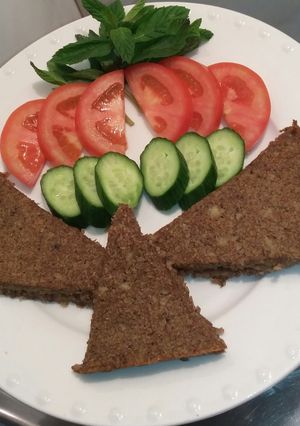 A picture of Baked Potato Kibbeh Stuffed with Meat.