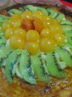 Una foto de Hojaldre de crema y frutas frescas