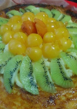 Una foto de Hojaldre de crema y frutas frescas