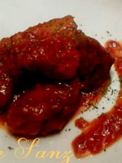 Una foto de Bonito con tomate.