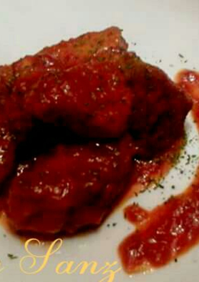 Una foto de Bonito con tomate.