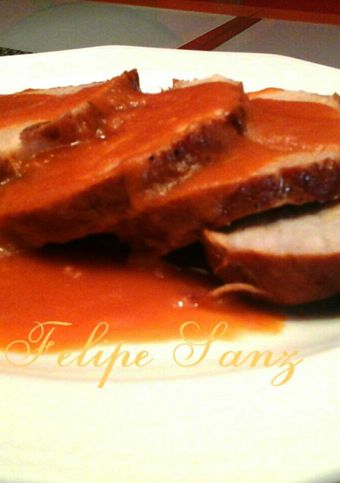 Una foto de Lomo en salsa.