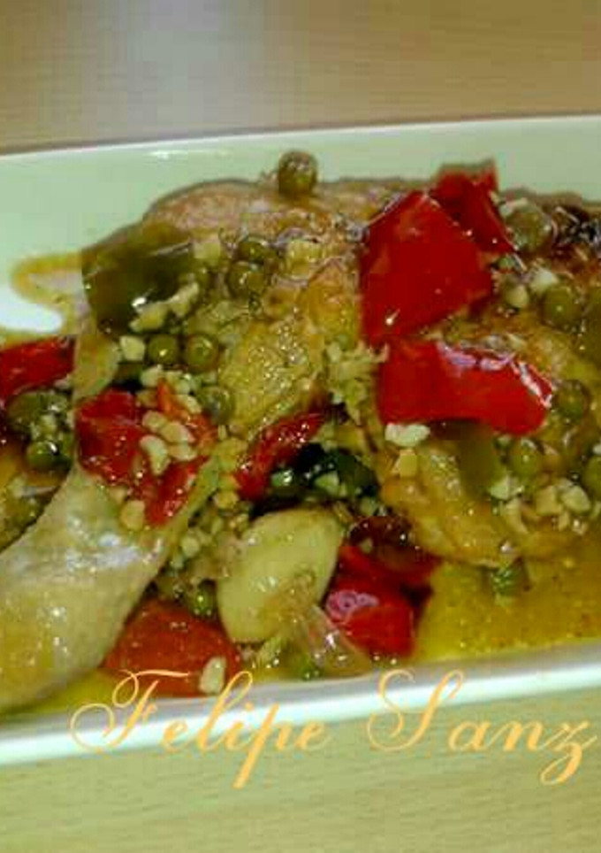 Una foto de Pollo con almendras a la cerveza