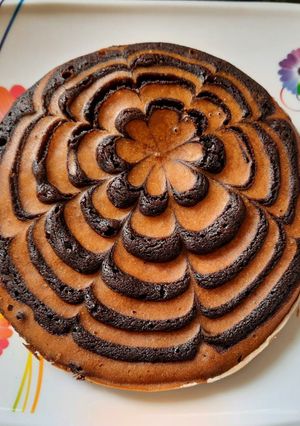 A picture of Biscuit Marble cake/ Eggless Marble cake without oven.