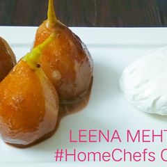 A picture of Poached pears with chocolate and ice-cream.