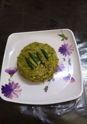 A picture of Bottle gourd peel poppy seeds paste steamed curry(bati posto).