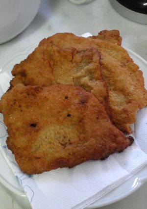 Una foto de Milanesa con pan y harina