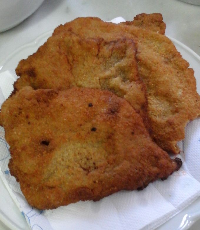 Una foto de Milanesa con pan y harina