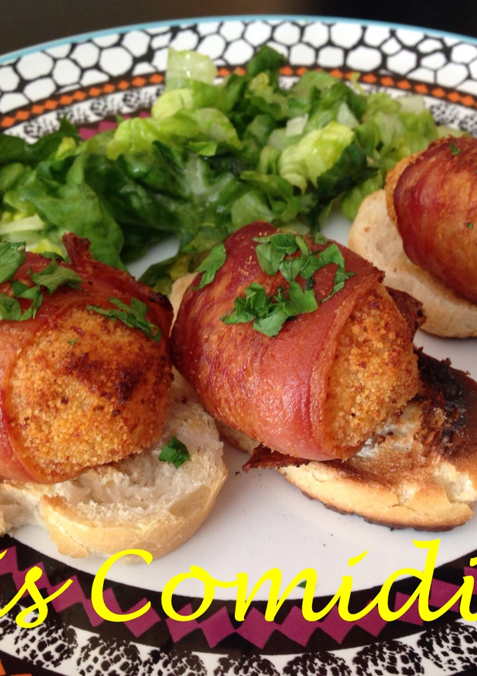 Una foto de Patatitas al chorizo envueltas en bacon