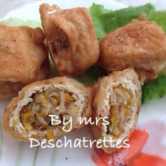 A picture of Tofu stuffed with vegetables .