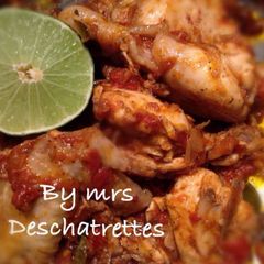 A picture of Ayam rica rica.