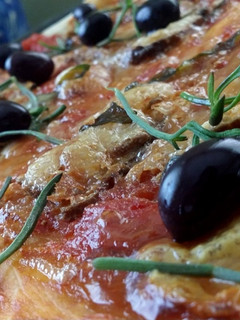 Una foto de Pizza
