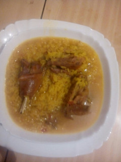 Una foto de Arroz con pollo de campo