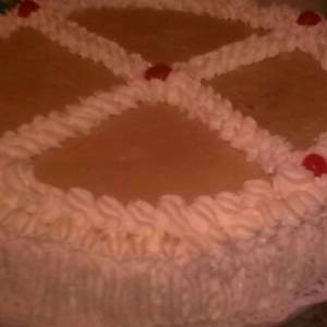 Tarta de crema pastelera con licor de crema catalana  y nata