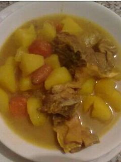Una foto de Patatas con cordero