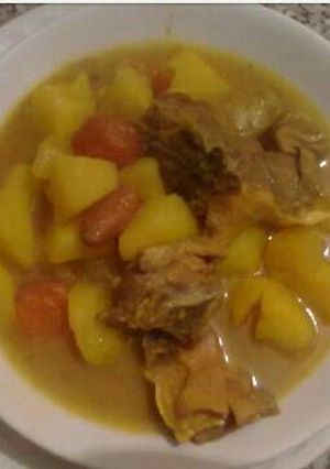 Una foto de Patatas con cordero 