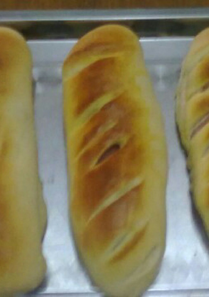 Una foto de Barras de pan de leche rellenado de jamon york y queso