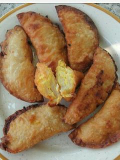 Una foto de Empanadilla rellena de tortilla de patatas